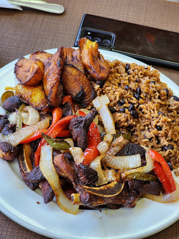 El Bohio plate: carnitas, rice and beans, fried plantains